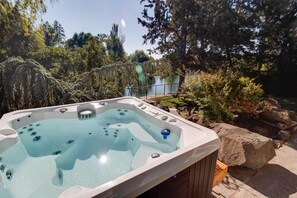 Views from the river from the hot tub in the serene backyard