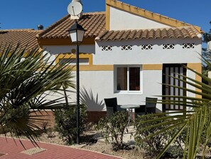 Private terrace in beautiful gardens.