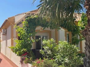 Garden. Garden with sitting and sunbathing terrace.