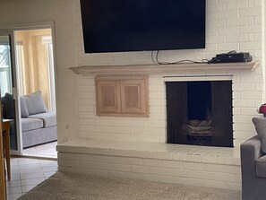 65” 4K TV and gas fireplace 