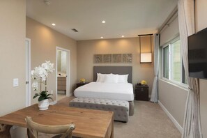 Bedroom with a King bed and flat-screen TV