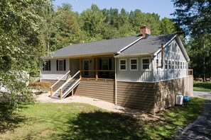 Welcome home to Paddlers Paradise, this gorgeous and expansive waterfront home with private pool, firepit, volleyball, waterfront gazebo and deck