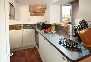 Ground floor:  Well-equipped and modern kitchen