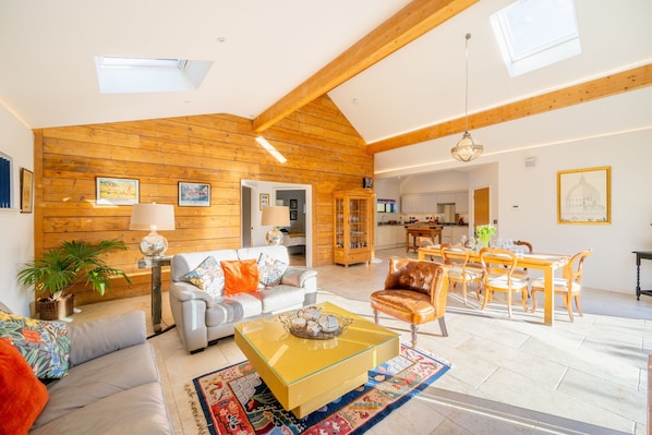 A tranquil ambiance awaits you in the beautiful open-plan living area