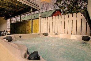 Relax in our amazing hot tub! Photo taken at sunset!