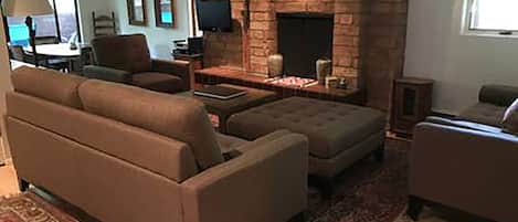 Living Room, dining area to left. New sofa set.