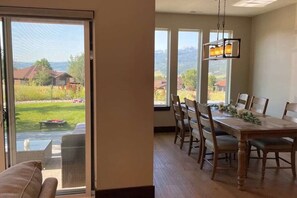 Separate dining area, tucked off the kitchen, a few short steps to the patio, with stunning views of the mountains and back yard.