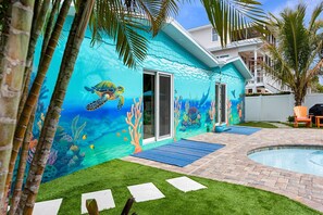 The kids will love the mural by the pool