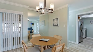 Dining room with mirrored wall