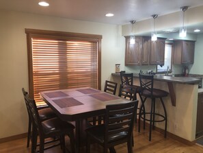 beautiful dining room table with available leaf seats 5-7. 