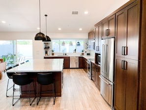 Huge Kitchen + Open Concept + Quartz Countertops + Wine Fridge
