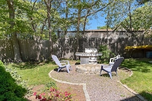 Gas grill, outdoor seating area