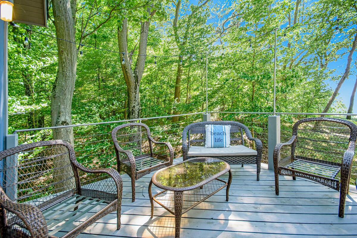 Dog-friendly home with lake views, wood stove, kayaks/SUPs, & W/D