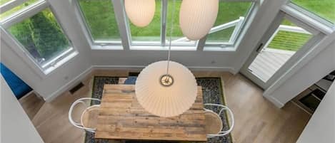 View of dining area from second floor landing