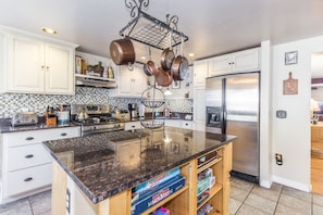 Fully-equipped kitchen with a standard drip coffee pot.