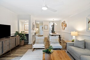 Living Room with Flat Screen TV, and Private Balcony