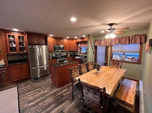 Open-floor layout of the kitchen, with all the appliances 