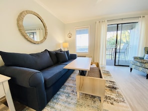 Lift top coffee table.. perfect spot to work or eat in front of the brand new TV