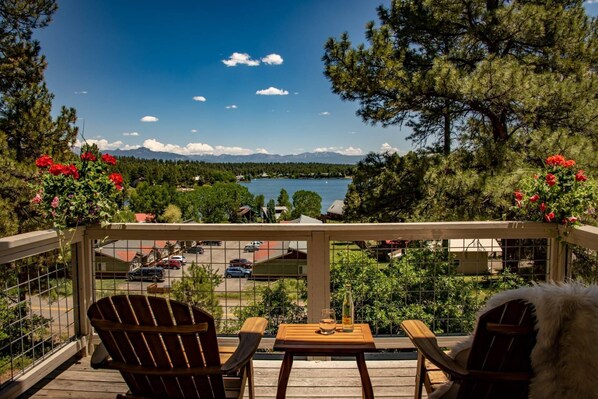 Relax for the afternoon on this amazing balcony.