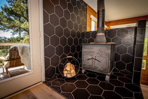 Rustic fireplace adorns the living space
