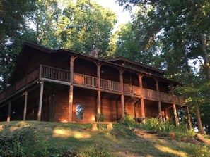 The Lodge at Pine Haven. Stunning, updated 3500 sq ft log home. 4 log queens beds and 1 enormous king. 4 bathrooms. Pool & Ping Pong Table, Darts, Game Table, Two LCD Smart TVs. Fantastic dock and amazing deck with incredible patio fire pit.