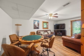 The couch folds out if you need to squeeze in a 5th or 6th guest. 65" Flat Screen with smart apps. Stream Amazon Prime, Netflix, Hulu and Youtube. (Using your own account).