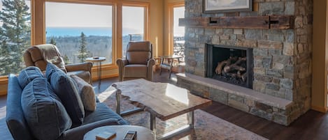 Main Floor Living Room with fully swivel recliners and a kids game table