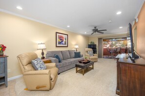 Two leather recliners and sofa bed couch.