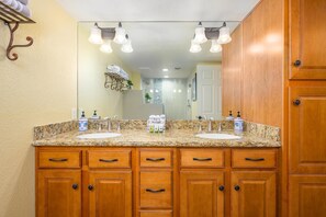 Raised granite dual vanity.