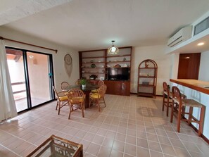 Living / Dining area including flat screen tv