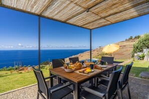 Enjoy outdoor meals under the porch