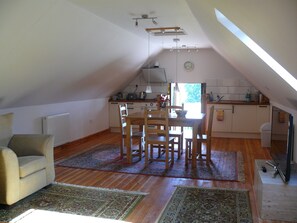 Upper dining area and kitchenette