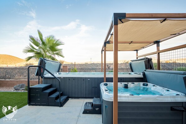 Backyard with swim spa and hot tub