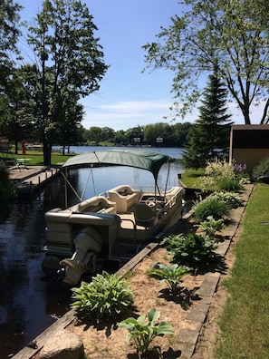 Seawall overlooking canal and lake. Small boat or pontoons welcome. NO I/O motor