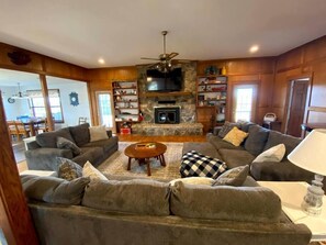 Family room with large smart TV, surround sound, toys, and games!