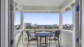 Gulf views from the third floor balcony - new white polywood set added