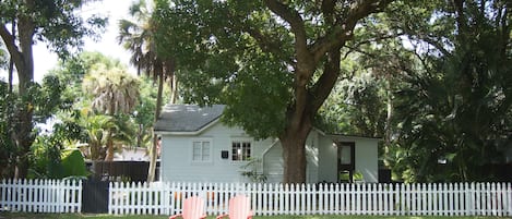 The property sits on a half acre of land, fully fenced in.