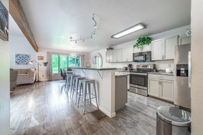 Open kitchen/dining/living room