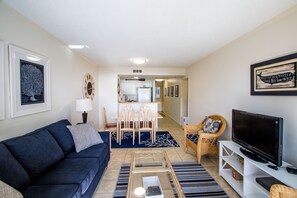 View of dining and kitchen from living area