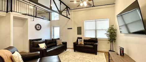 Living room / main entry / loft space. 60" TV and comfortable seating!