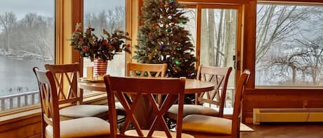 Dining room during fall/winter, overlooking lake. Song Mountain can be seen too.