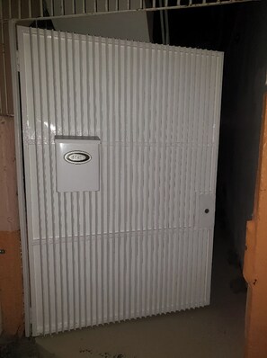 Main entrance gate. (Always locked for security reason)