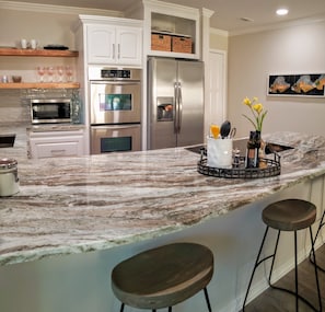 Gourmet kitchen with seating