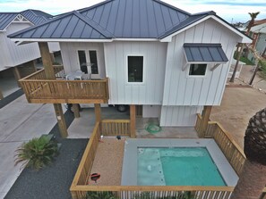 Front exterior/pool view