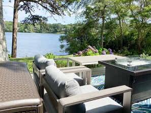 Relax outside on the private patio, enjoying the water views and bird activity.