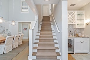 Front Entry Way with Access to Second Floor, Living Room, or Wet Bar