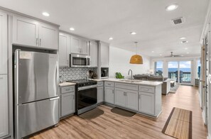 The kitchen is fully equipped with all your kitchenware appliances and needs for a seamless culinary experience.