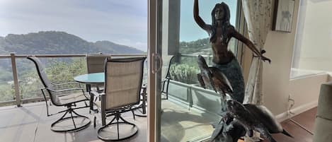 Aloha, our treasured mermaid welcomes guests to Aloha Avila. Ocean views and the historic Seven Sisters mountains surround you.