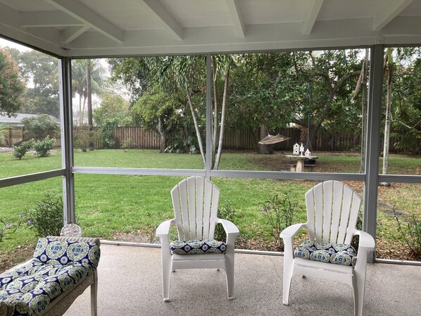 Serene and spacious outdoor area with dining table. Hammock for enjoying.