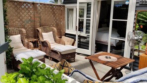 Relax in the unique indoor/outdoor veranda.